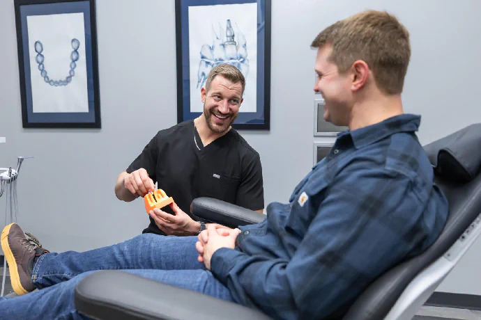 dr. brandon chapek with a patient